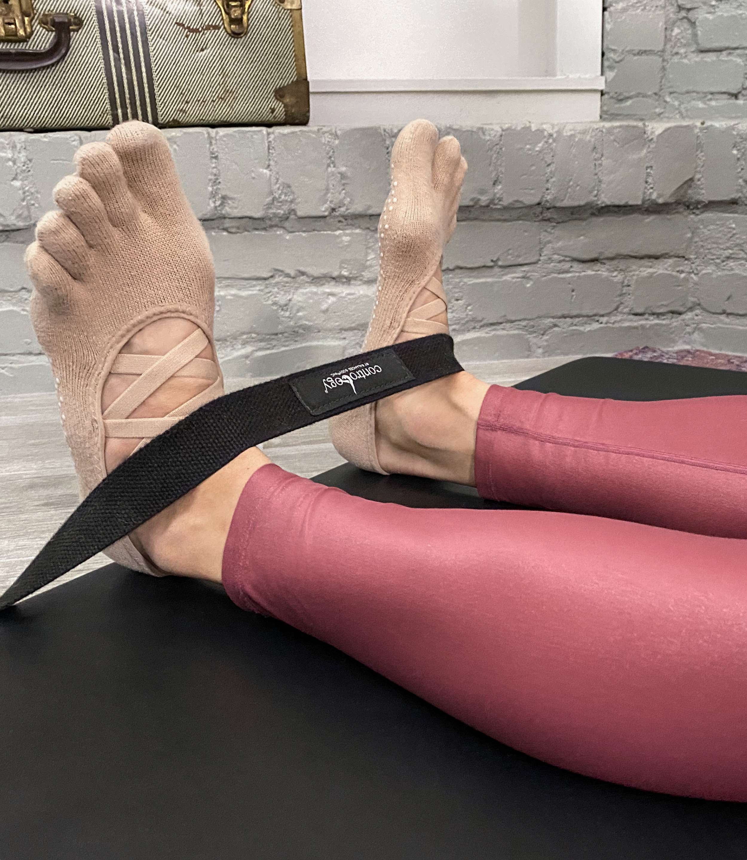 Contrology Folding Mat Footstrap in use