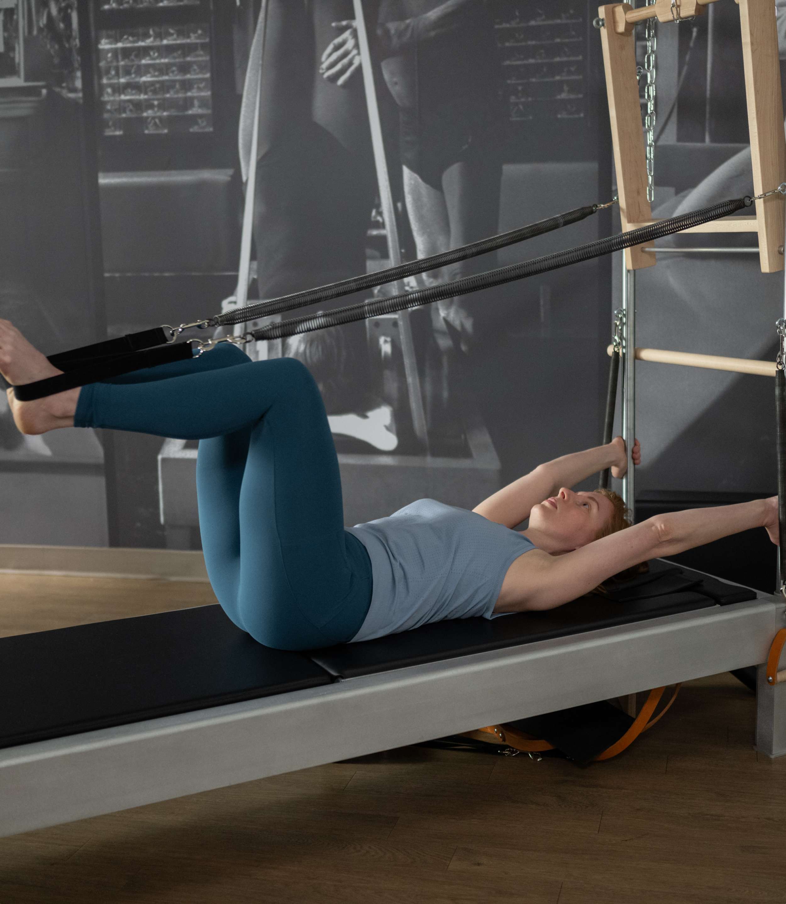 Contrology Reformer with Tower and Mat - in use