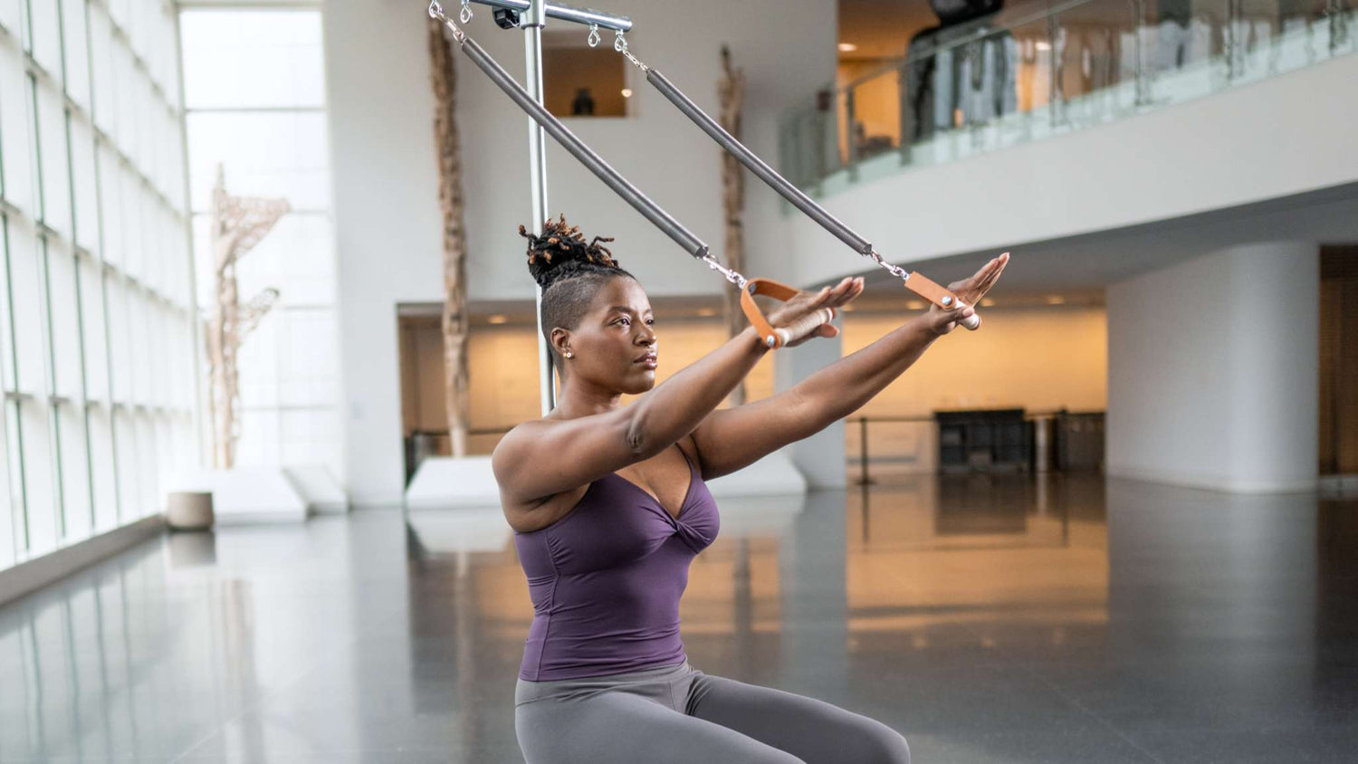 woman arms out using ped-o-pul handles