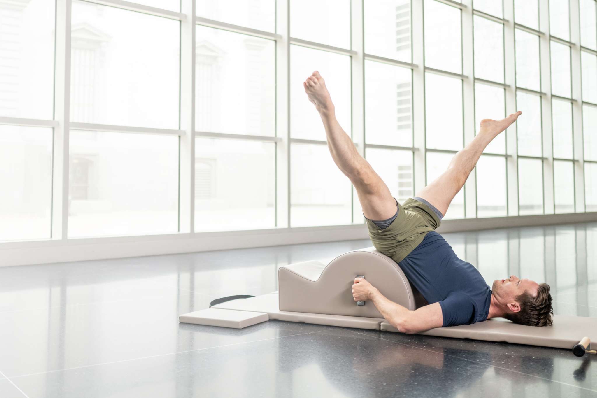 spine corrector and folding mat in use