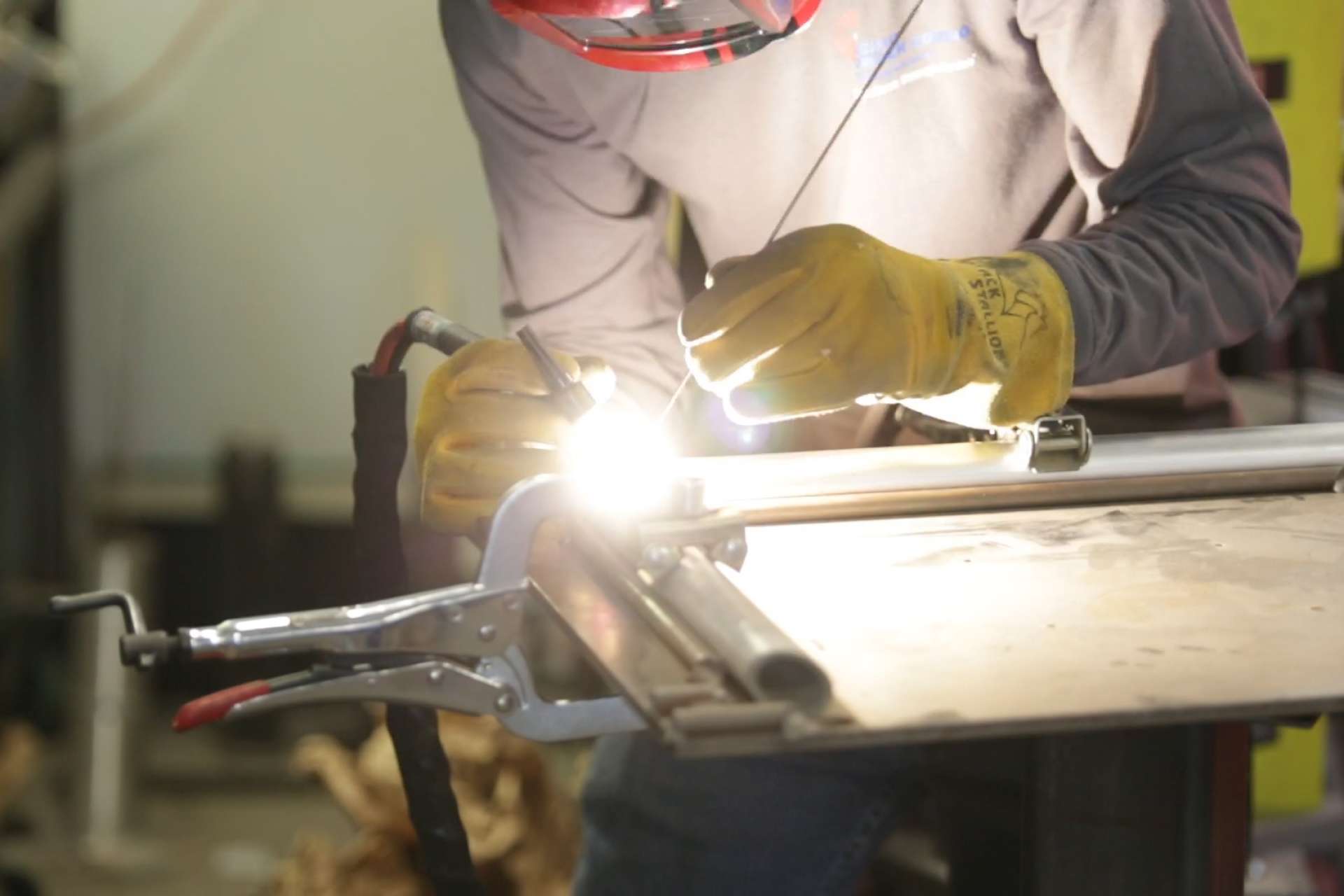 Load video: a welder welding