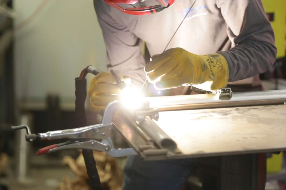 a welder welding